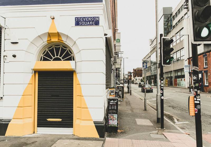 A painted doorway on Stevenson Square in Manchester's Northern Quarter